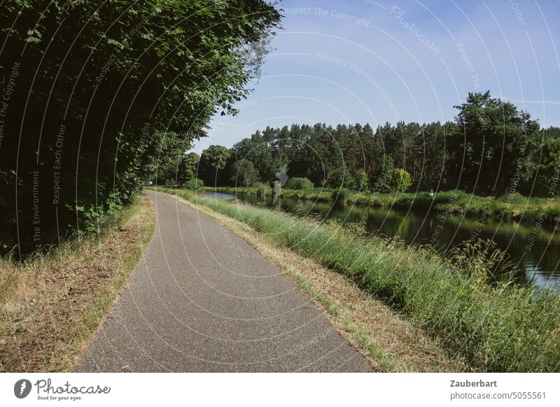 Bike path along a canal in Brandenburg in late summer cycle path Channel Cycling ride a bike Curve Asphalt Summer bushes trees bank Cycle path Wheel