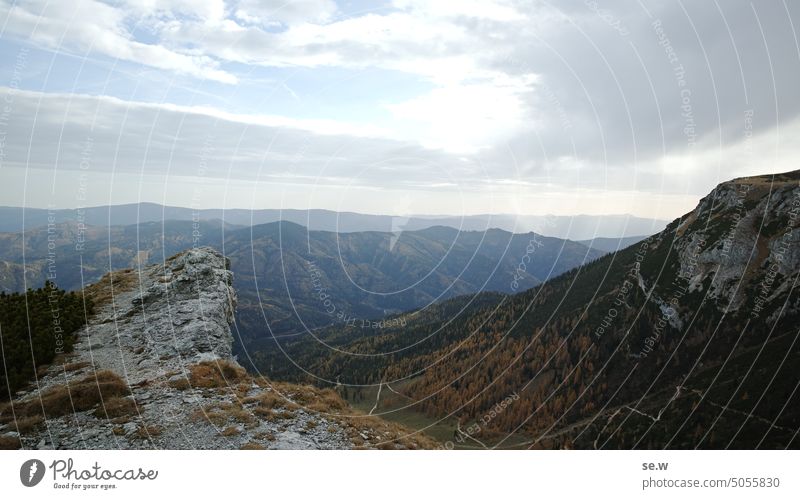 distant view over the surrounding mountains in the Alps from the Rax via ferrata hiking trail alpine landscape rax Remote View Jawbone sunny Autumn Larch