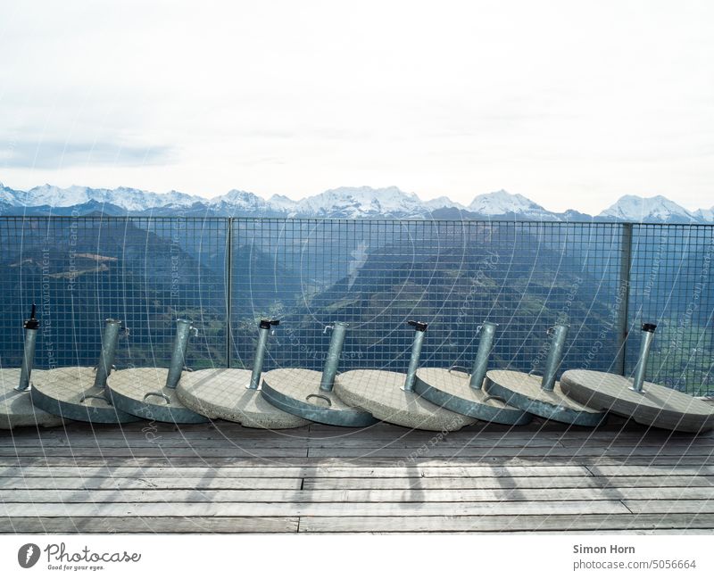 Umbrella stand in front of alpine panorama Panorama (View) Tourism Mass tourism tourism industry Mountain Vacation & Travel Alps Mountain range tidied