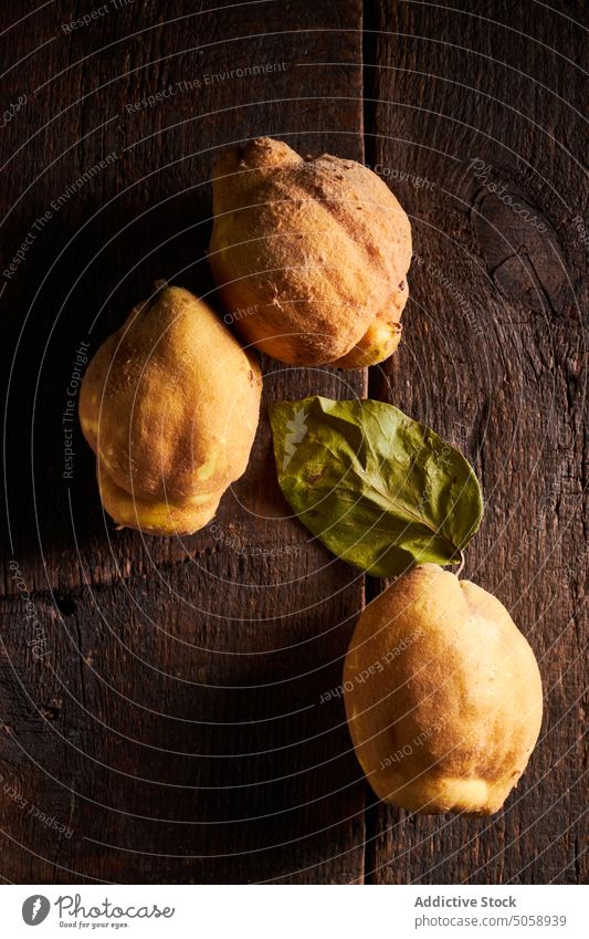 Fresh yellow lemons serving on wooden surface ingredient preserve healthy food citrus fresh fruit leaf tasty whole delicious vitamin c nutrition table diet