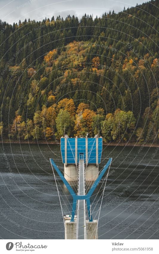 Sance reservoir near the village of Ostravice in the heart of the Beskydy Mountains surrounded by autumn colourful forest. Visit Czech republic sance reservoir