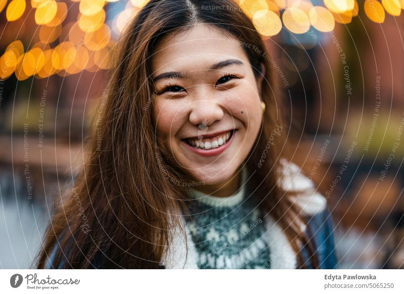 Portrait of a young woman in the city real people candid girl adult fun urban city life youth millennials Millennial Generation cool cool attitude asian