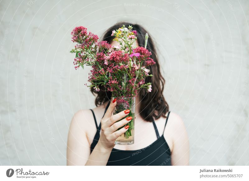 Woman with bouquet in front of face portrait pretty flowers Spring Summer Sun Nature Girl Lifestyle Young woman Human being Adults Day 18 - 30 years naturally