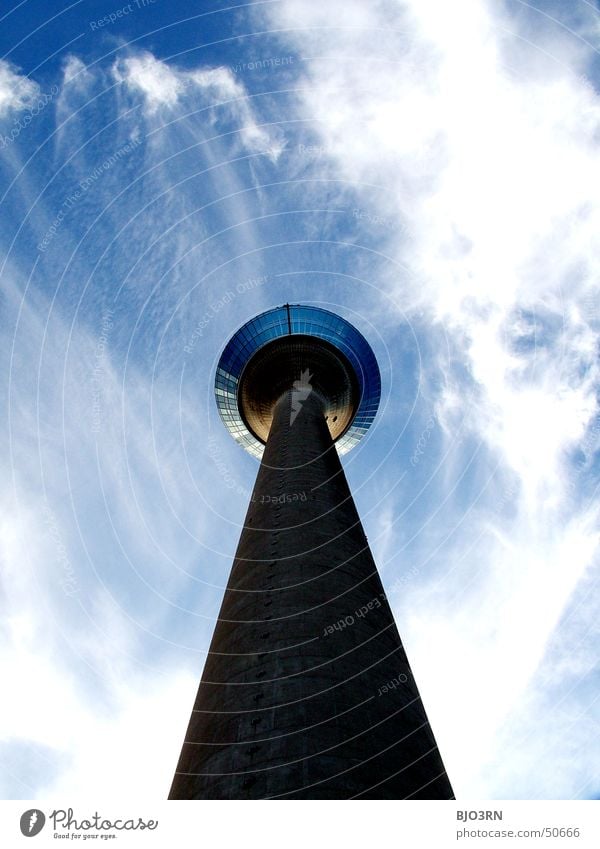 a fine specimen Clouds Rheinturm North Rhine-Westphalia Window Might Long Impressive Manmade structures Vantage point Platform Sky Tower Blue wise Duesseldorf