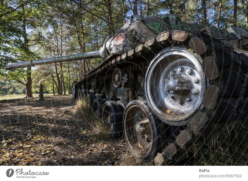 Old tank on a military training area. Shell Tower Cannon gun technique Army Squad War Weapon armament technology Armaments Armouring was handwheel Mechanics