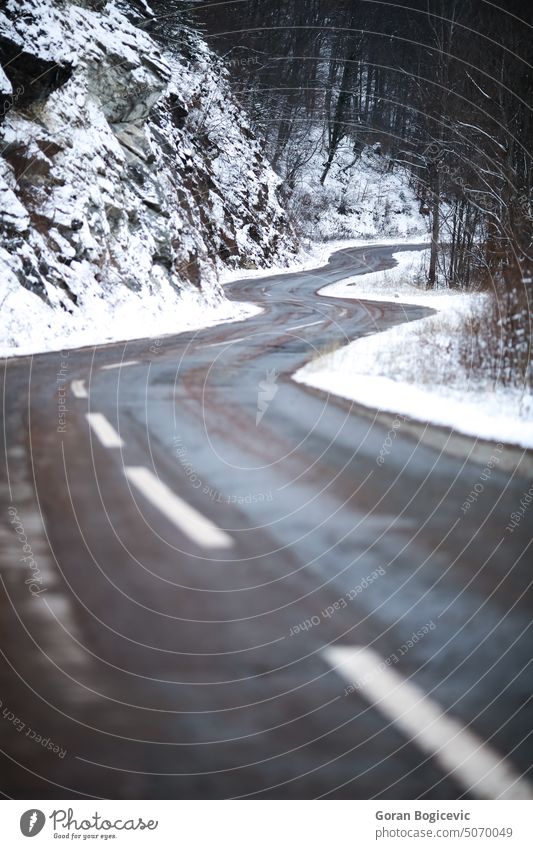 Mountain road in winter snow cold white frost nature ice travel weather asphalt forest snowy trees season day environment country outdoor nobody scene