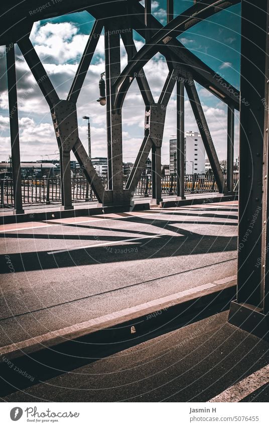 Steel bridge Bridge Architecture Sky Blue Exterior shot Metal Day Colour photo Deserted Manmade structures Town Clouds Street Gray Beautiful weather Shadow