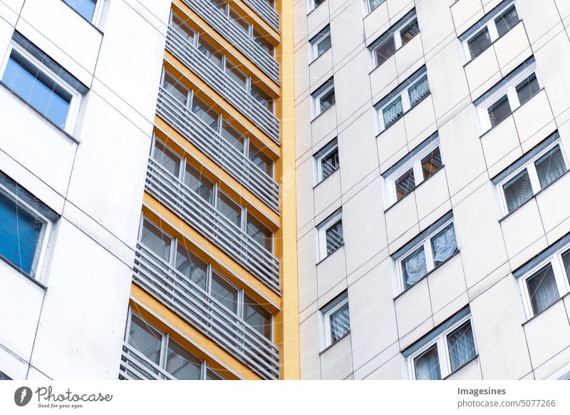 Facade of urban apartments. Urban apartment complex. Detail of facade of multi-storey apartment building. Apartment building, old architecture, residential building. Germany, Mainz, Rhineland