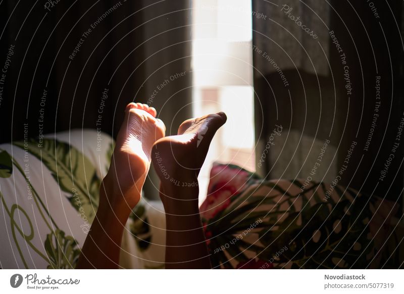 Feet of a young boy on the sofa at home Feet up Boy (child) Child body Legs body part Sofa Home relaxed one person natural light feet Barefoot Toes Infancy