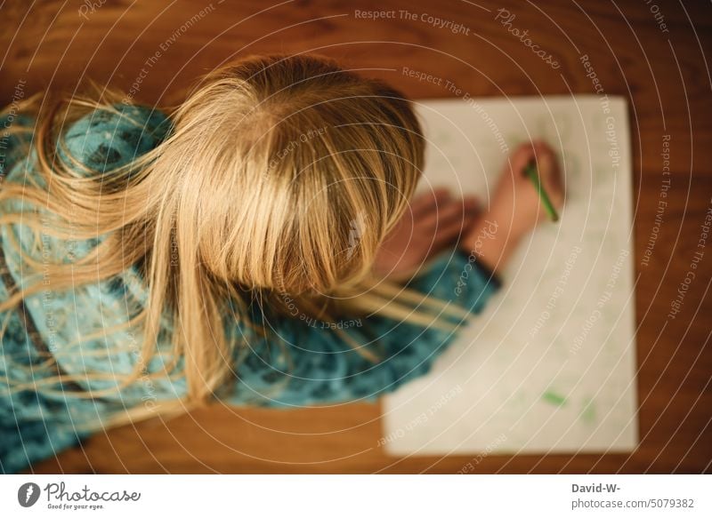 Girl writes something with pen on a piece of paper Child Write Piece of paper School Study creatively Diligent concentrated Leaf Paper Anonymous Homework