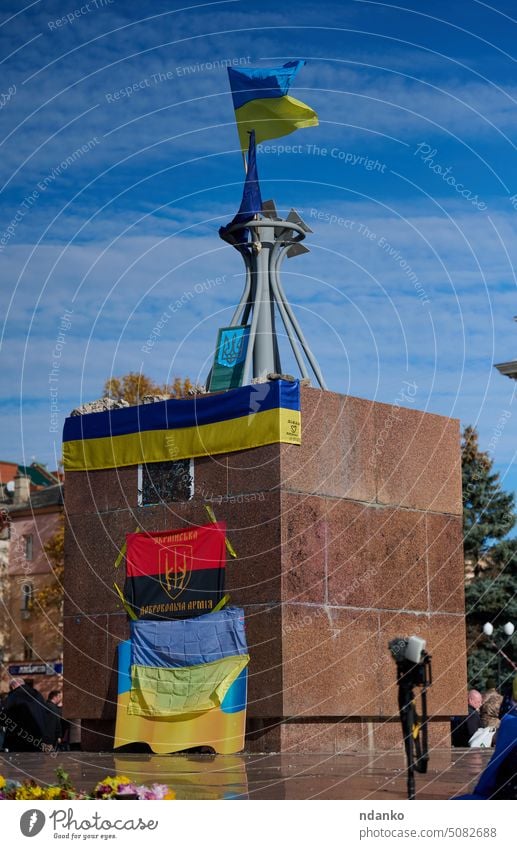 Ukraine, Kherson - November 14, 2022: Flags of Ukraine on the memorial of the fallen Heavenly Hundred in the center of Kherson city square deoccupation