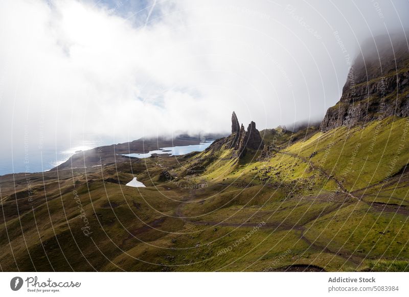 Green mountain located in Skye Island Scotland scenery range lake highland nature autumn cold skye island scotland europe landscape majestic weather ridge cliff