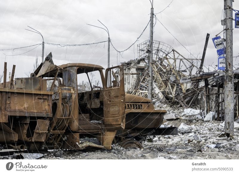 burnt cars and destroyed buildings of the workshop of the Azovstal plant in Mariupol Russia Ukraine abandon army attack blackout blown up bombardment broken