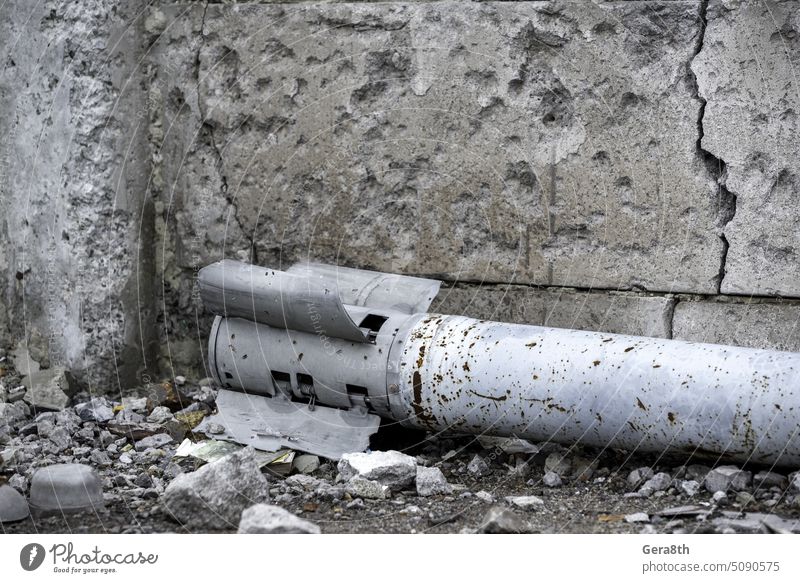 weapon rocket lying on the ground near the wall in Ukraine Donetsk Kherson Kyiv Lugansk Mariupol Russia Zaporozhye abandon abandoned air defense army attack