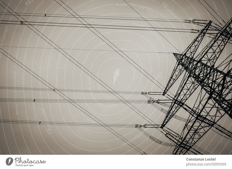 High voltage pylon with intersecting double lines. energy revolution transmission lines Environmental protection Climate Resource Save energy power line