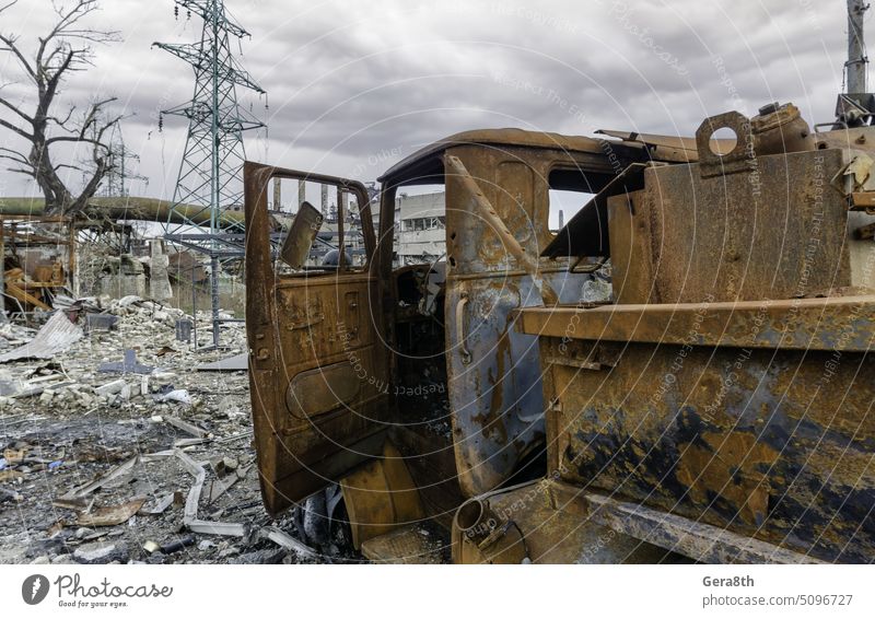 burnt cars and destroyed buildings of the workshop of the Azovstal plant in Mariupol Russia Ukraine abandon attack blackout blown up bombardment broken