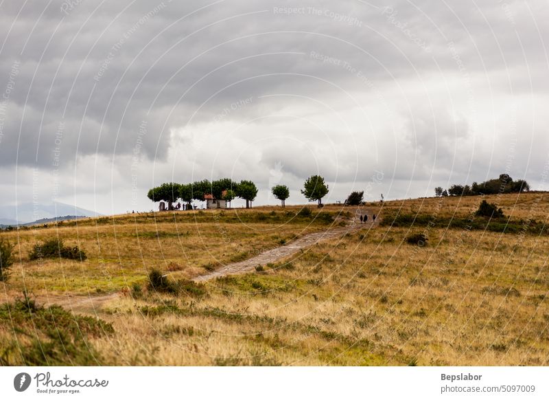 Capilla de Soyartz along the Chemin du Puy, French route of the Way of St James capilla de soyartz chapel church trees hill landscape field sky chemin du puy