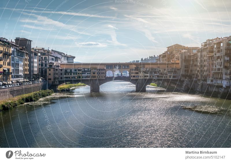 The Ponte Vecchio over the river Arno, Firenze Italy ponte vecchio landscape firenze travel bridge water historic famous architecture italy europe landmark