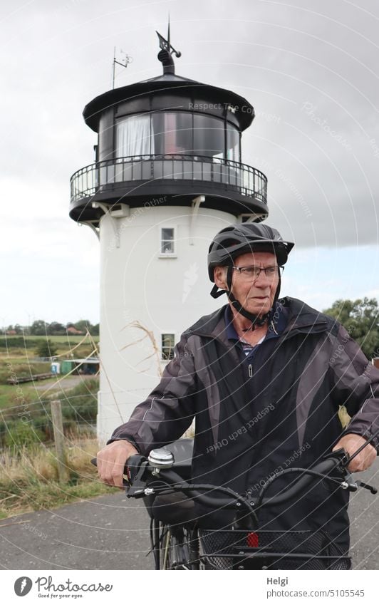 close to nature | senior standing with his bike in front of the "Dicken Berta" on the Elberadweg in Cuxhaven Human being Man Senior citizen cyclists Bicycle