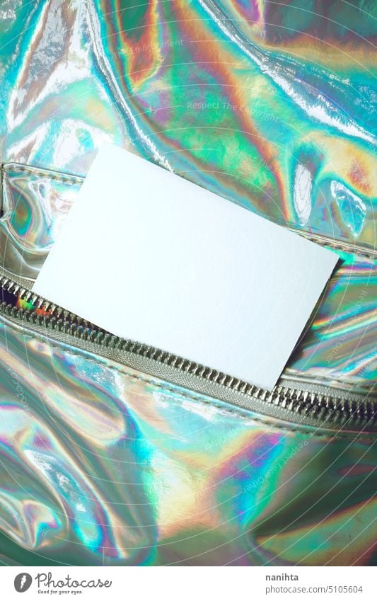 Mockup of a business card with a holographic texture as background iridiscent mockup blank rainbow surface oil creativity art weird crazy different concept