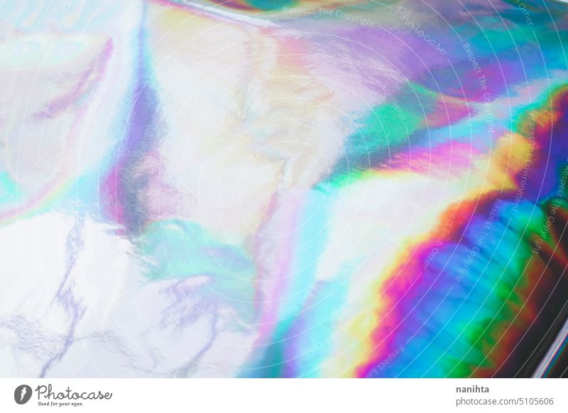 Rainbow holographic vivid background iridiscent rainbow psychedelic new age multi colored oil distorted shiny colorful blur abstract detail spectrum wave