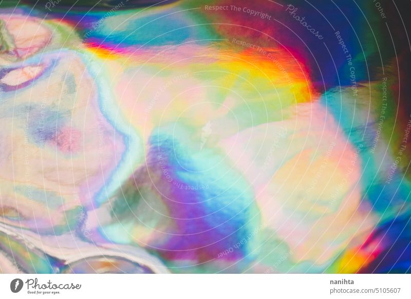 Rainbow holographic vivid background iridiscent rainbow psychedelic new age multi colored oil distorted shiny colorful blur abstract detail spectrum wave