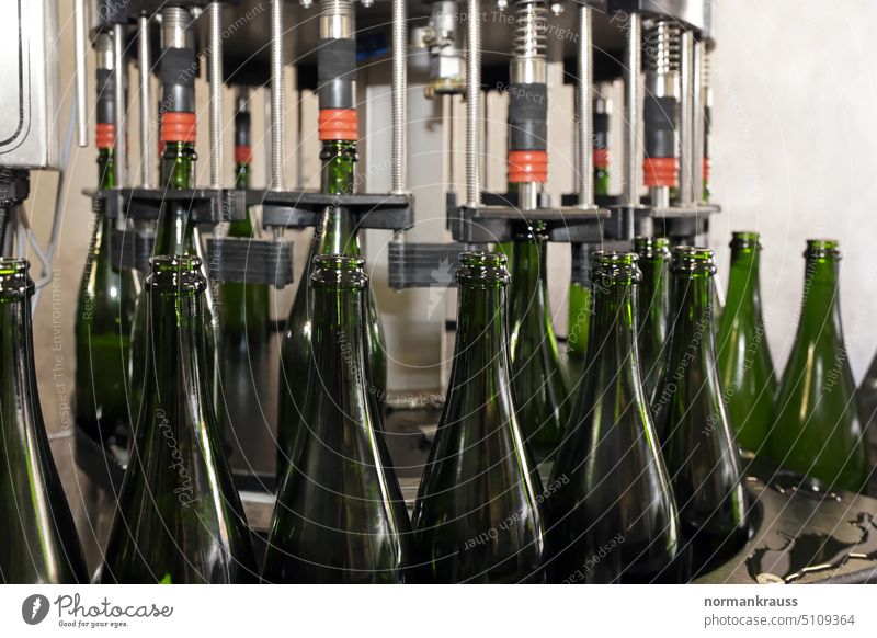 Filling machine Sparkling wine fill champagne bottling Bottle filling machine Beverage Alcoholic drinks Conveyor belt Production Winery Machinery Glass