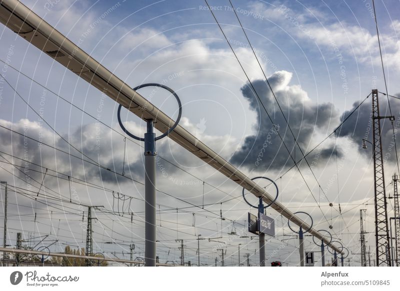 well threaded Train station Overhead line Platform Railroad Transport Public transit Rail transport Means of transport Exterior shot Commuter trains