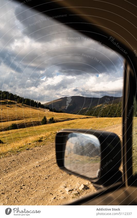 View from car on mountain valley scenery window trip cloudy ridge nature road trip landscape destination vehicle automobile travel peak pyrenees europe harmony