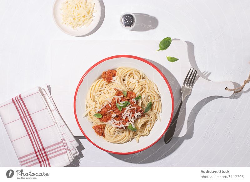 Bolognese pasta with sauce on table spaghetti natural mince italy bolognese herb bowl minced meat italian spaghetti bolognese leaf mediterranean culture beef