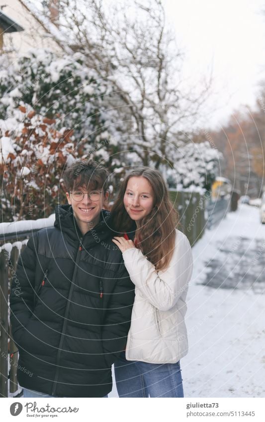 Siblings portrait, little brother - big sister, teenager in winter Brothers and sisters Sister Boy (child) Girl Exterior shot Looking into the camera Smiling