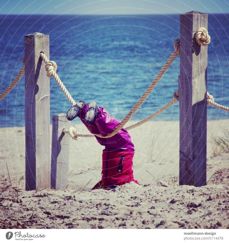 Child on the beach Beach Playing Ocean Vacation & Travel Water Human being Girl Joy Sand Sun Day coast Exterior shot