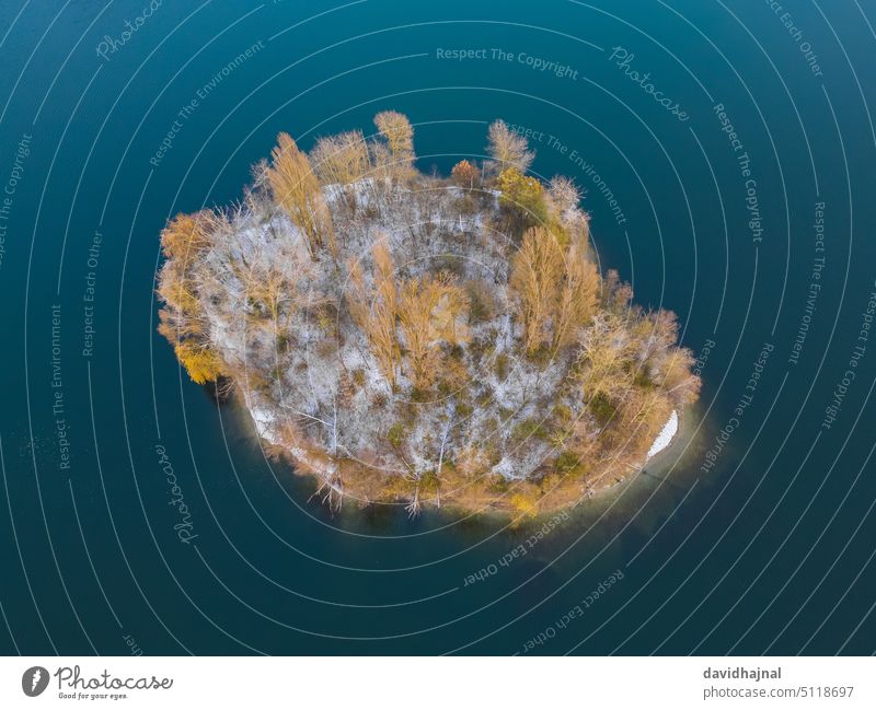 Aerial view of a small island in Lake Binsfeld near Speyer. Pond Quarry binsfeldsee Germany Rhine River Sunset Dusk boat ship Small Little Island panorama