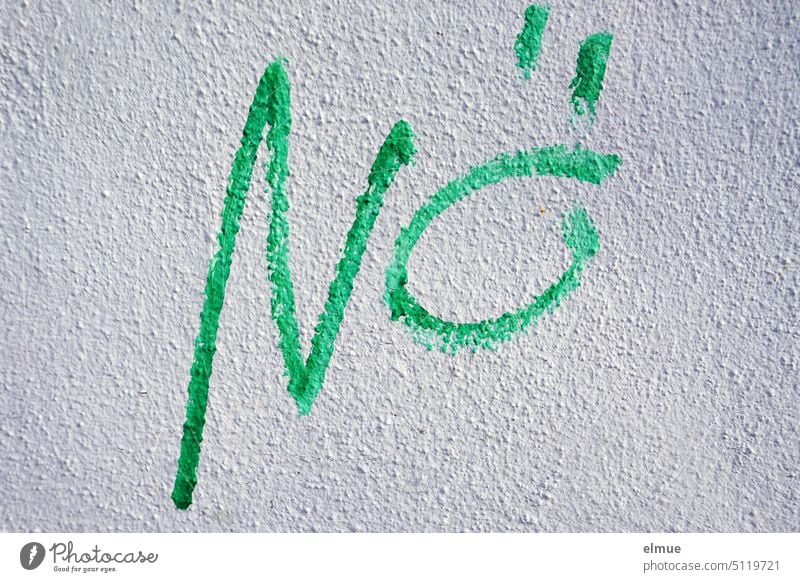 Lower Austria stands in green on a gray wall / cancellation Nope. no nee Never never Cancelation Graffiti Blog Denial house wall Youth culture Daub Green Gray