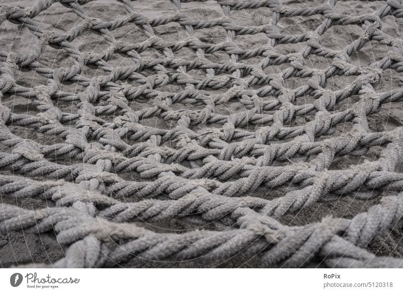 Rope network of a children's swing. Rope team rope Net Network Sphere technique Strength Hold wickerwork climbing scaffold Playground playground Child Infancy