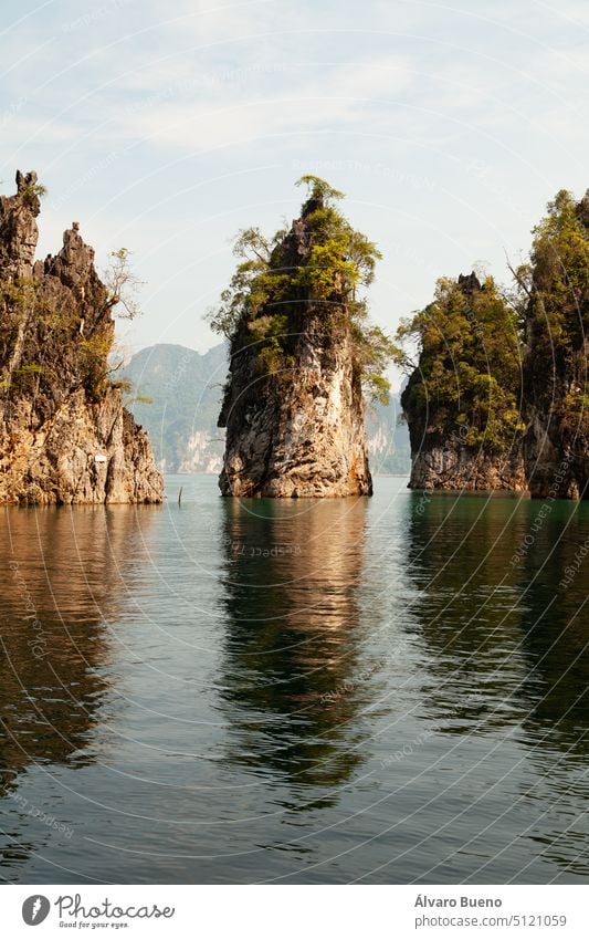 Khao Sam Kloe, a dream place at Cheow Lan Lake, Thailand Khao Sok National Park landscape nature travel mountains karst formations rainforest green vegetation