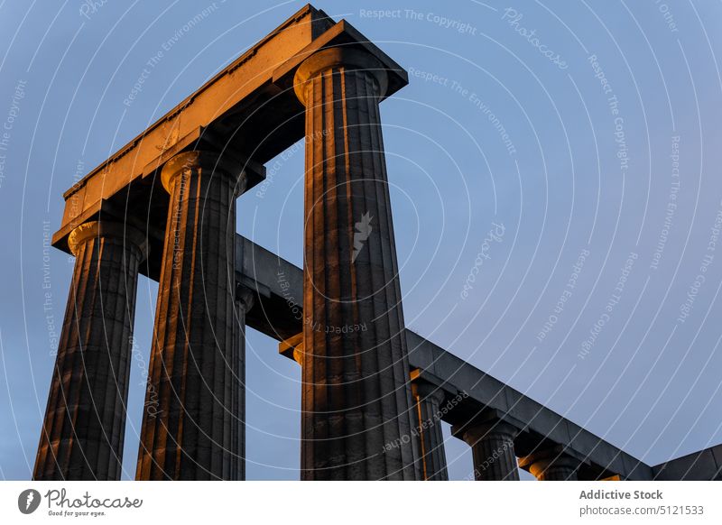 Monument with columns against blue sky monument attract old famous daytime edinburgh scotland uk united kingdom great britain calton hill