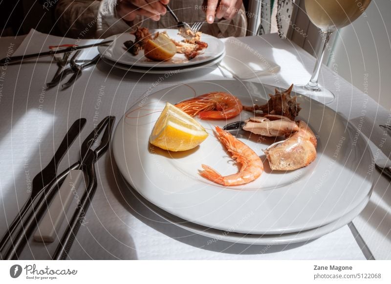 First person view at lunch in seafood restaurant shrimps eating gourmet crab crab meat crab scissors Nutrition prepared delicious meal Shrimps Food Seafood