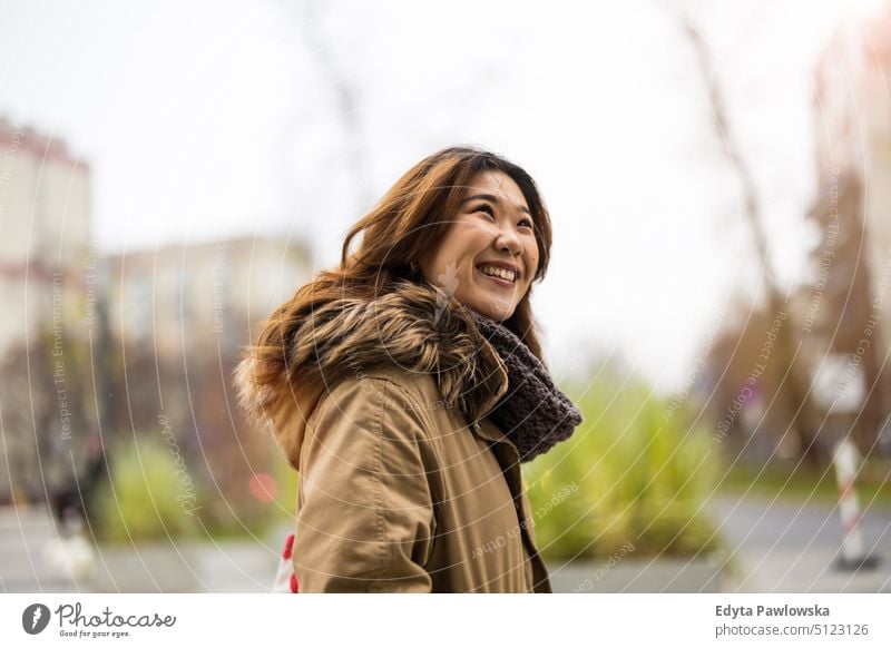 Portrait of young woman in the city real people candid girl adult fun millennials Millennial Generation asian Japanese happy smiling happiness one person