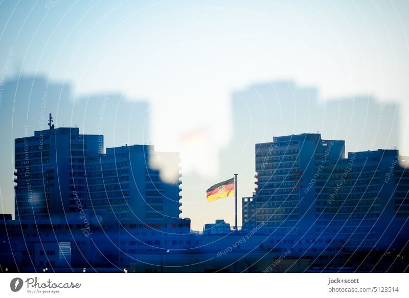 crazy flagging and skyscrapers in the German capital Tower block German Flag Ensign Silhouette Double exposure Blow Germany Downtown Berlin Patriotism Pride