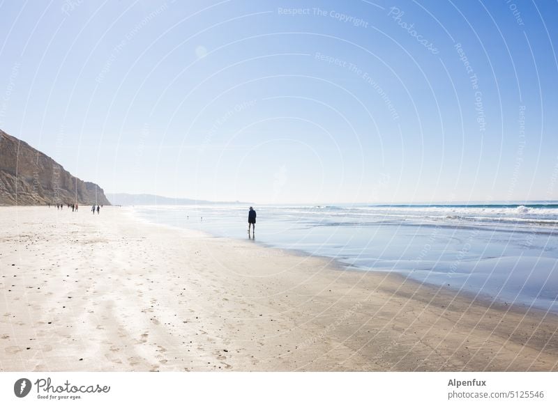 Border Runner Beach coast Ocean Water Relaxation Vacation & Travel Sand Waves vacation Nature Horizon Sandy beach Loneliness retreat Sky Pacific Ocean