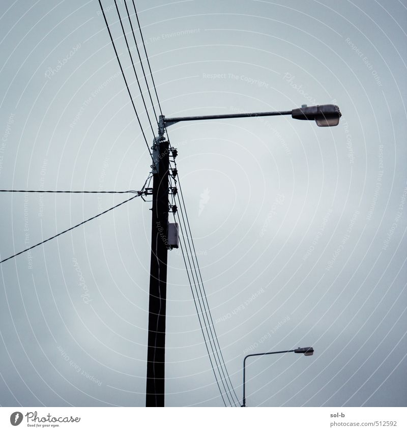 village crossroads Living or residing Energy industry Sky Clouds Storm clouds Bad weather Village Town Street Network Esthetic Dark Tall Above Services