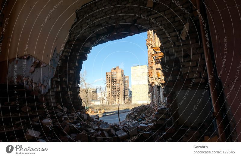 destroyed and burned houses in the city Russia Ukraine war abandon abandoned attack blown up bombardment broken building burned out conflict crisis dangerous