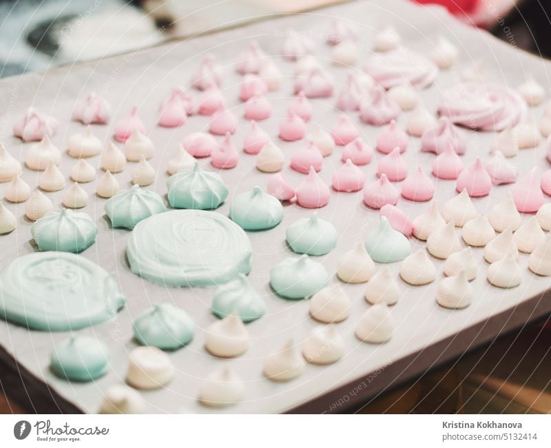 Meringue pattern on white background. Top view. fresh delicious vanilla dessert texture meringue food sugar sweet tasty candy closeup confectionery cookie