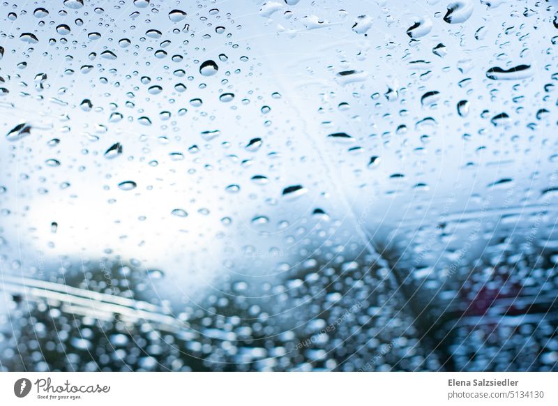 Glass pane in the rain Rain Drop raindrops blurred Water Close-up Drops of water Wet Weather