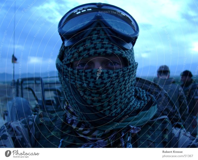 Bundeswehr soldier in Afghanistan looks directly into the camera military Soldier Man Adults Eyes Sky Desert Headscarf Shemag Authentic Exceptional Threat