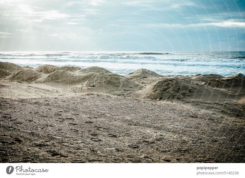 hilly beach landscape Beach Beach life Beach dune Vacation & Travel coast Ocean Summer Exterior shot Tourism Landscape Sand Walk on the beach Water Hill