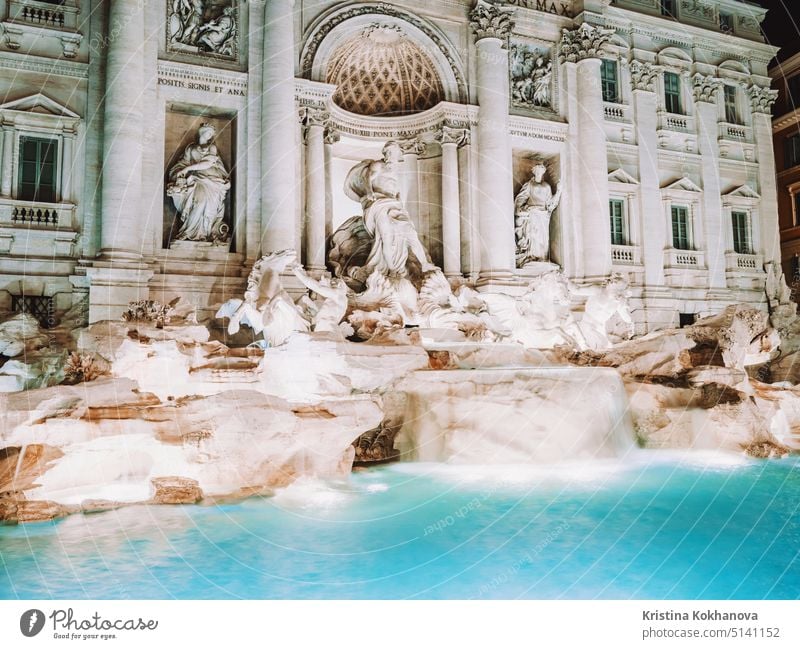 Night at Trevi Fountain with illumination, most famous fountain in Rome, Italy. trevi art baroque italian italy monument neptune roma rome sculpture statue