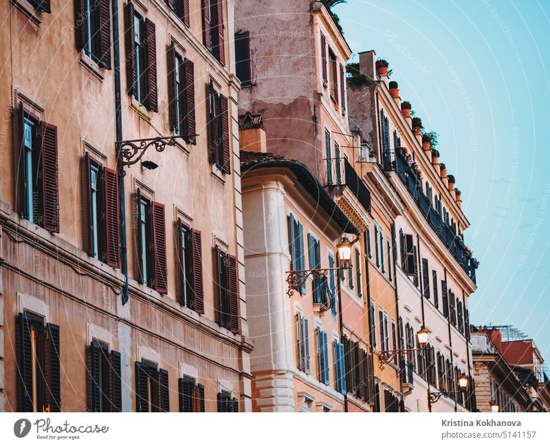 Beautiful facade of apartment building in Rome, Italy. Windows with shutters. wall home tourism architecture house city exterior italy old rome window urban