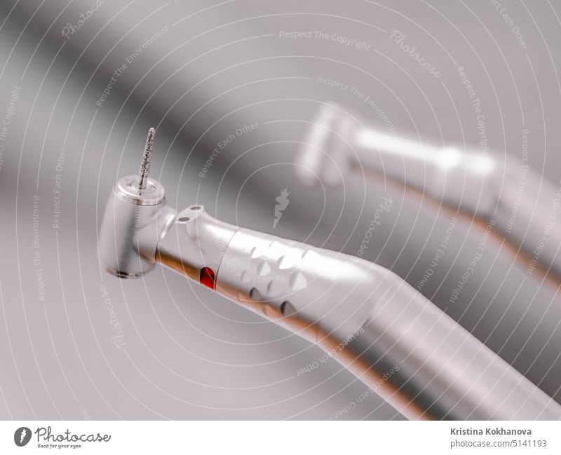 Macro view of dentist drill in clinic. Work tool of stomatologist for drilling a patient's teeth. Health and medicine concept. Close up. equipment dental care